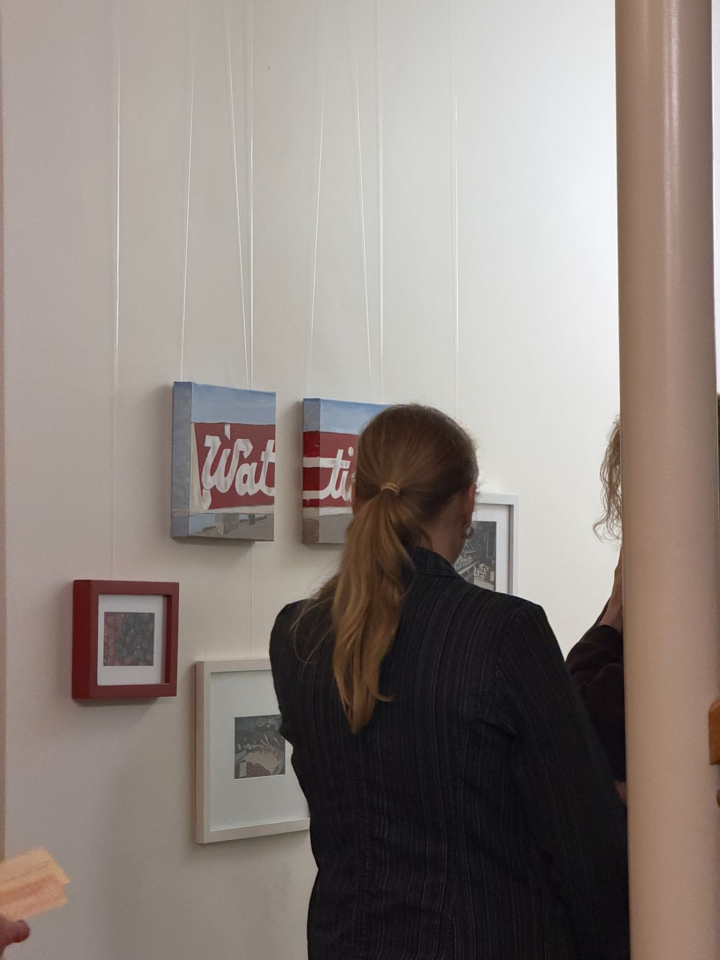 Visitor looking at art